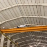 جرثقیل سقفی دو پل (Double Girder Overhead Crane) یکی از انواع پیشرفته جرثقیل‌های سقفی است